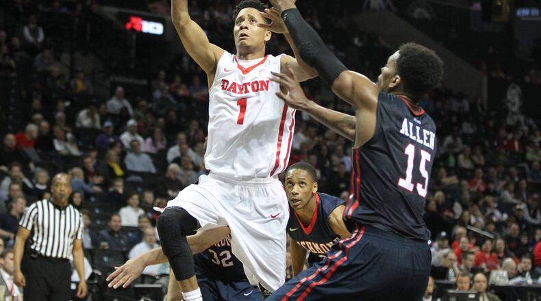 Dayton’s Darrell Davis shoots against Richmond’s Terry Allen in the quarterfinals of the Atlantic 10 tournament on Friday, March 11, 2016, at the Barclays Center in Brooklyn, N.Y. David Jablonski/Staff