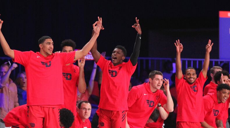 Dayton players celebrate on the bench after a 3-pointer in the first half against Butler in the first round of the Battle 4 Atlantis on Wednesday, Nov. 21, 2018, at Imperial Gym on Paradise Island, Bahamas.