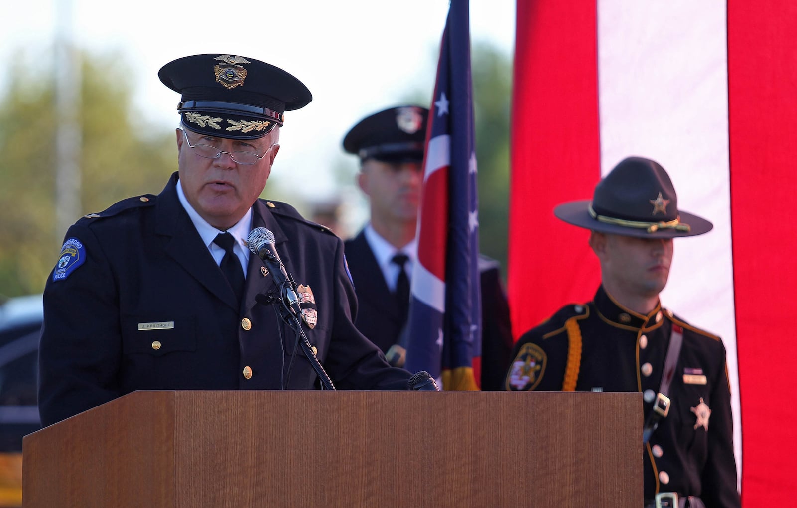 Springboro Police Chief Jeff Kruithoff recites Words of Remembrance during the September 11, Remembrance Ceremony and Commemoration at the Warren County 9/11 Memorial, Tuesday, September 11, 2012, in Lebanon. Photo by Robert Leifheit/Contributing Photographer
