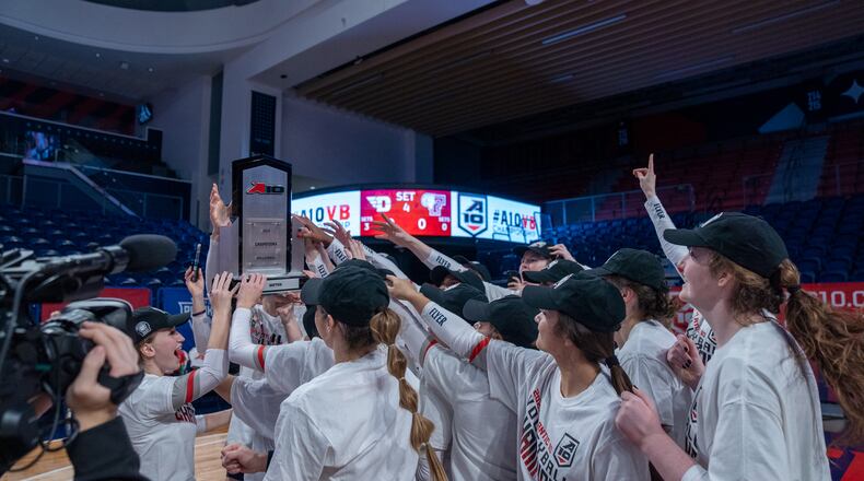Dayton celebrates after winning the Atlantic 10 Conference volleyball tournament championship on Sunday, Nov. 21, 2021, at the UMPC Cooper Fieldhouse in Pittsburgh, Pa. Photo courtesy of Dayton Athletics
