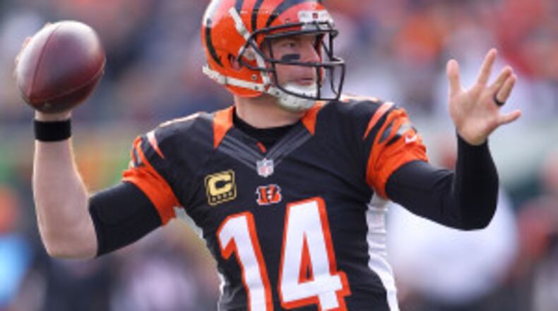 CINCINNATI, OH - JANUARY 1: Andy Dalton #14 of the Cincinnati Bengals throws a pass during the first quarter of the game against the Baltimore Ravens at Paul Brown Stadium on January 1, 2017 in Cincinnati, Ohio. (Photo by John Grieshop/Getty Images)