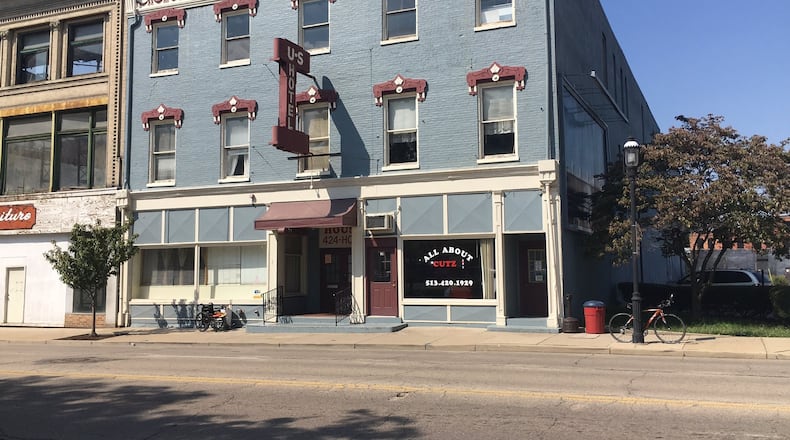 The building that houses a homeless shelter and barber shop on South Main Street in Middletown has been sold, according to Realtor Rachel Lewitt. RICK McCRABB/STAFF