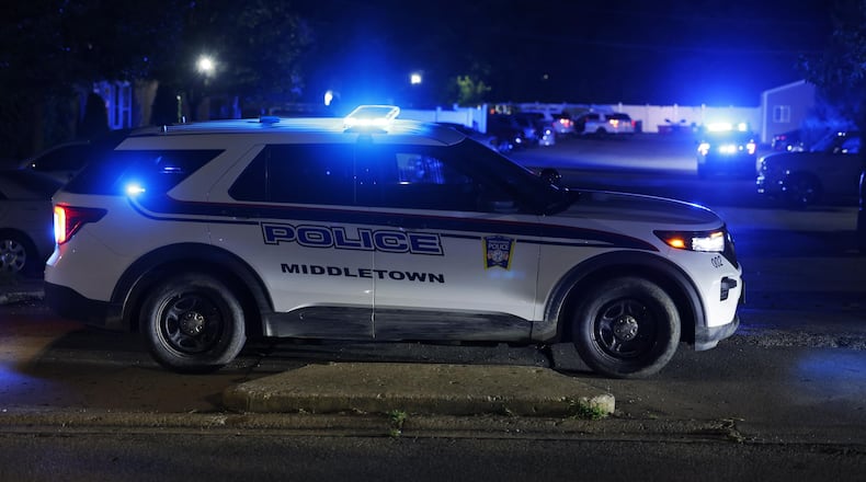 Middletown police at Liberty Manor Apartments after a man was reportedly shot Friday night. NICHOLAS GRAHAM//STAFF