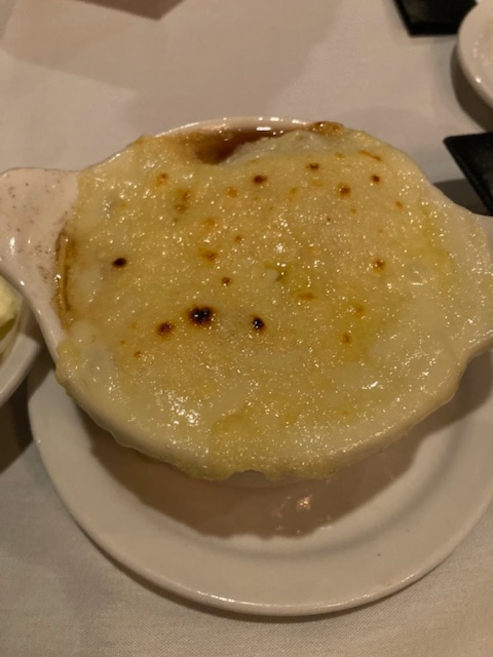 The French Onion soup at Paragon Supper Club in Washington Twp. has a rich beefy broth and soft caramelized onions, topped with a generous helping of bubbly Swiss cheese. RAY MARCANO/CONTRIBUTED