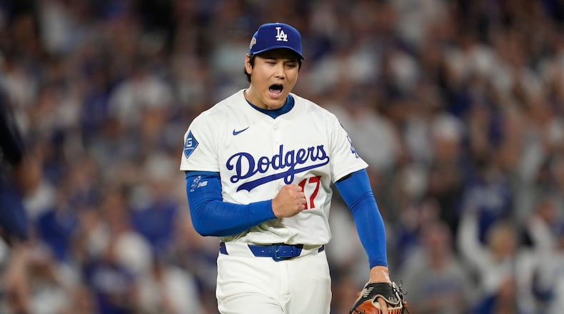 FILE - Los Angeles Dodgers pitcher Shohei Ohtani (17) reacts during Game 4 of baseball's National League Championship Series against the Milwaukee Brewers, Friday, Oct. 17, 2025, in Los Angeles. (AP Photo/Ashley Landis, File)