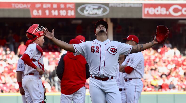 Reds reliever Fernando Cruz leaves the mound in the fourth inning against the Pittsburgh Pirates on Opening Day on Thursday, March 30, 2023, at Great American Ball Park in Cincinnati. David Jablonski/Staff