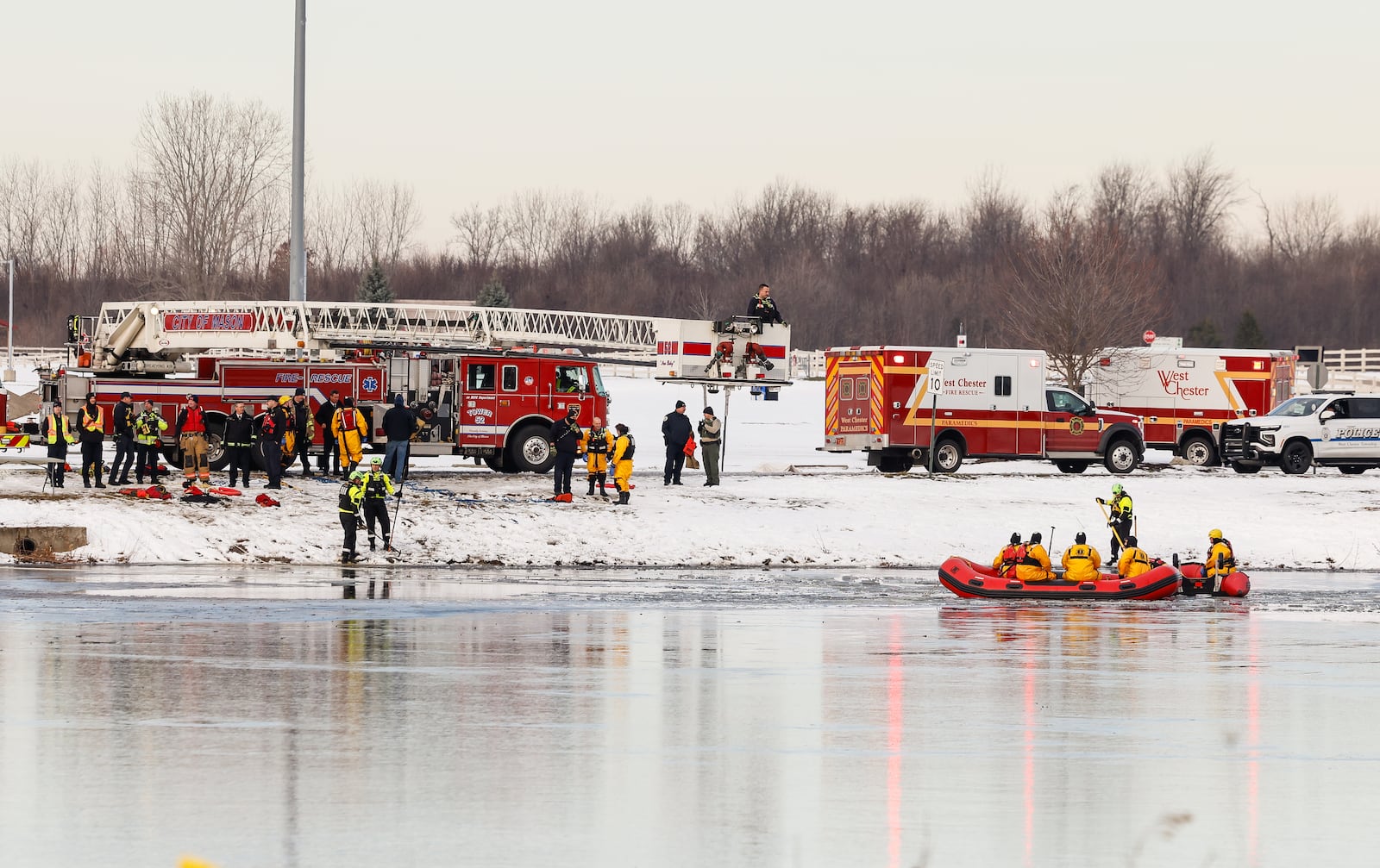 West Chester Twp. are searching VOA MetroPark pond for a potential water rescue. NICK GRAHAM/STAFF