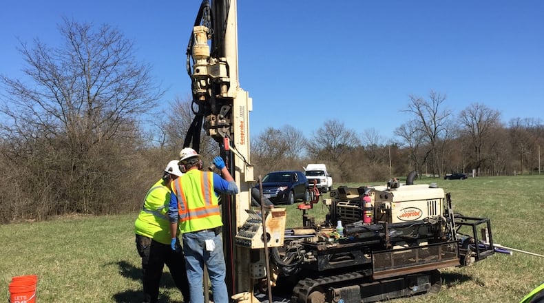 Wright Patterson Force Base crews collect drinking water samples from a field in Fairborn where a jet crashed in 1997. The base sampled 22 wells in nearby neighborhoods for a group of contaminants known as PFAS. Contributed