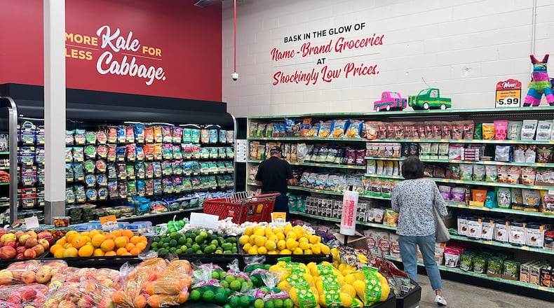 Grocery Outlet Bargain Market is looking to expand into the Dayton region with plans to open locations in Centerville and Englewood. This photo shows customers shopping at a Grocery Outlet store in Pleasanton, California in 2022. AP FILE