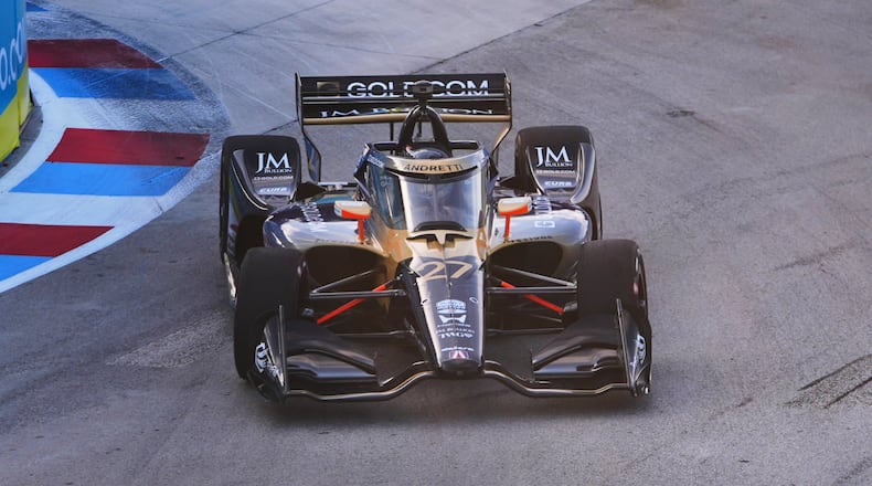 Driver Kyle Kirkwood takes a turn during practice for IndyCar Grand Prix of Arlington auto race, Saturday, March 14, 2026, in Arlington, Texas. (AP Photo/LM Otero)