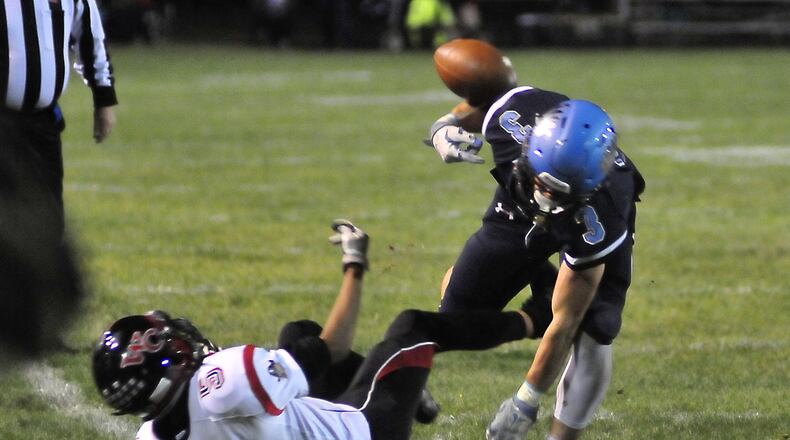 Skyhawk wide receiver Brandon Easterling (3) fights for the recovery of a fumble at Fairborn's High School's Buschemeyer Field, Friday evening October 21, 2016 where the Skyhawk's host the West Carrollton Pirates
102116hawkWC4
CHARLES CAPERTON/PHOTO