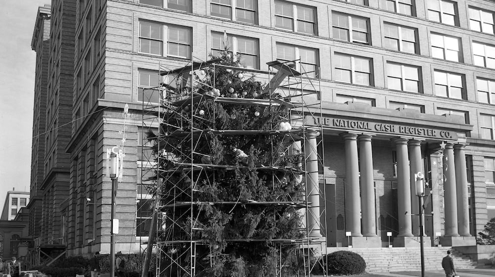 The NCR Christmas tree, seen here in 1948, stood outside NCR World Headquarters — Building 10 on South Main Street — as a tradition for decades. CONTRIBUTED PHOTO
