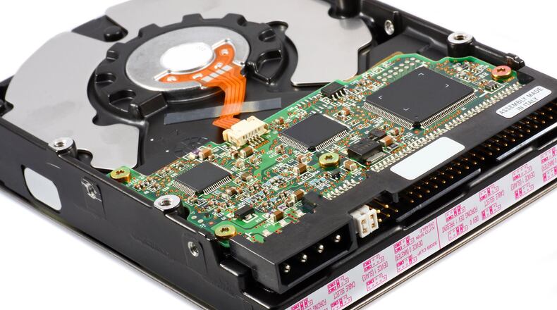 What do you do with old hard drives that will never be used again but are full of personal data? (Dreamstime/TNS)