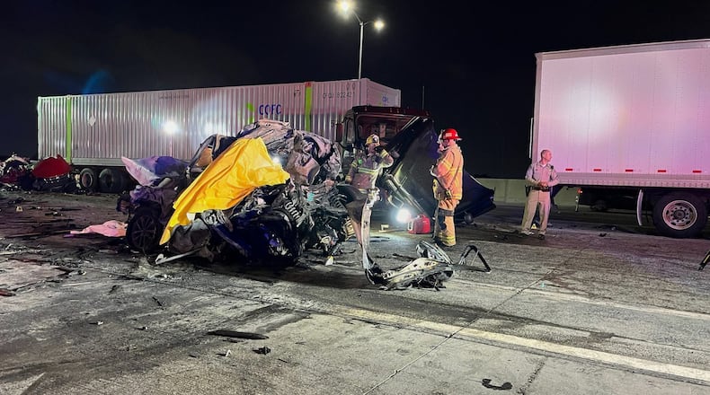 In this photo provided by the San Bernardino County District Attorney’s Office High Tech Crimes Unit, shows officials processing the scene of a deadly multi-vehicle crash Tuesday, Oct. 21, 2025, in Ontario, Calif. (San Bernardino County District Attorney’s Office High Tech Crimes Unit via AP)