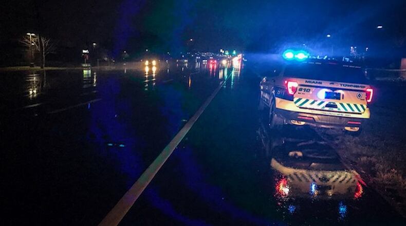 Police searched for a suspect Monday night on Ohio 741 after a police chase led to Miami Twp. Police towed the car from the crash scene, which was in the grass median on Interstate 75 near I-675. STAFF