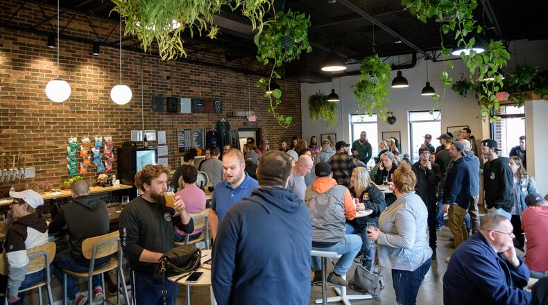 On Saturday, Jan. 11, Branch & Bone Artisan Ales near downtown Dayton released a special variant of their Candle series of Imperial Milk Stouts, called Banana Coffee Cake. TOM GILLIAM / CONTRIBUTING PHOTOGRAPHER