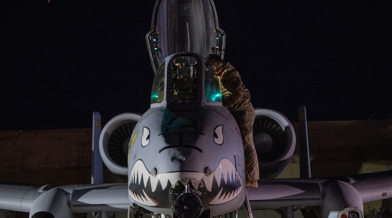 This photo provided by the U.S. Air Force shows a U.S. Airman preparing an A-10 Thunderbolt II for flight from a base in the U.S. Central Command area of responsibility, Friday, Dec. 19, 2025, in support of Operation Hawkeye Strike. (U.S. Air Force/DVIDS via AP)