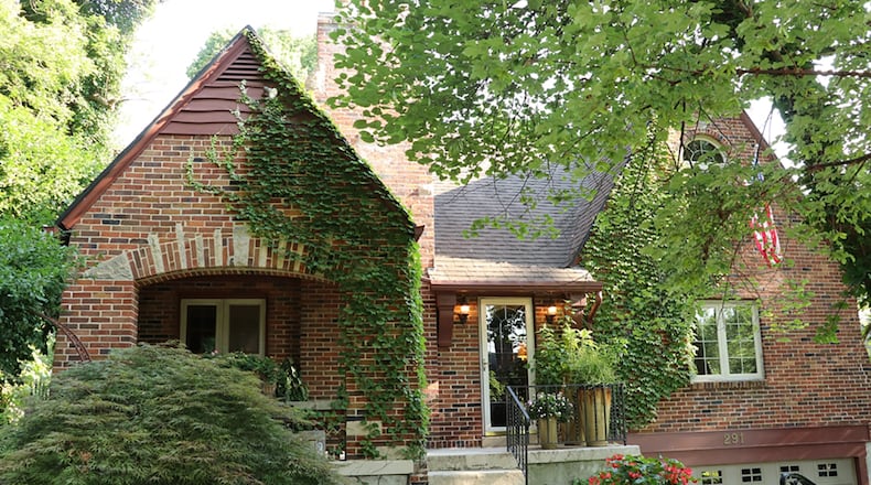 Built in 1932, the updated, brick story-and-half home has about 1,670 sq. ft. of living space plus a semi-finished basement. The home is in a park-like setting on a three-parcel lot. CONTRIBUTED PHOTO BY KATHY TYLER