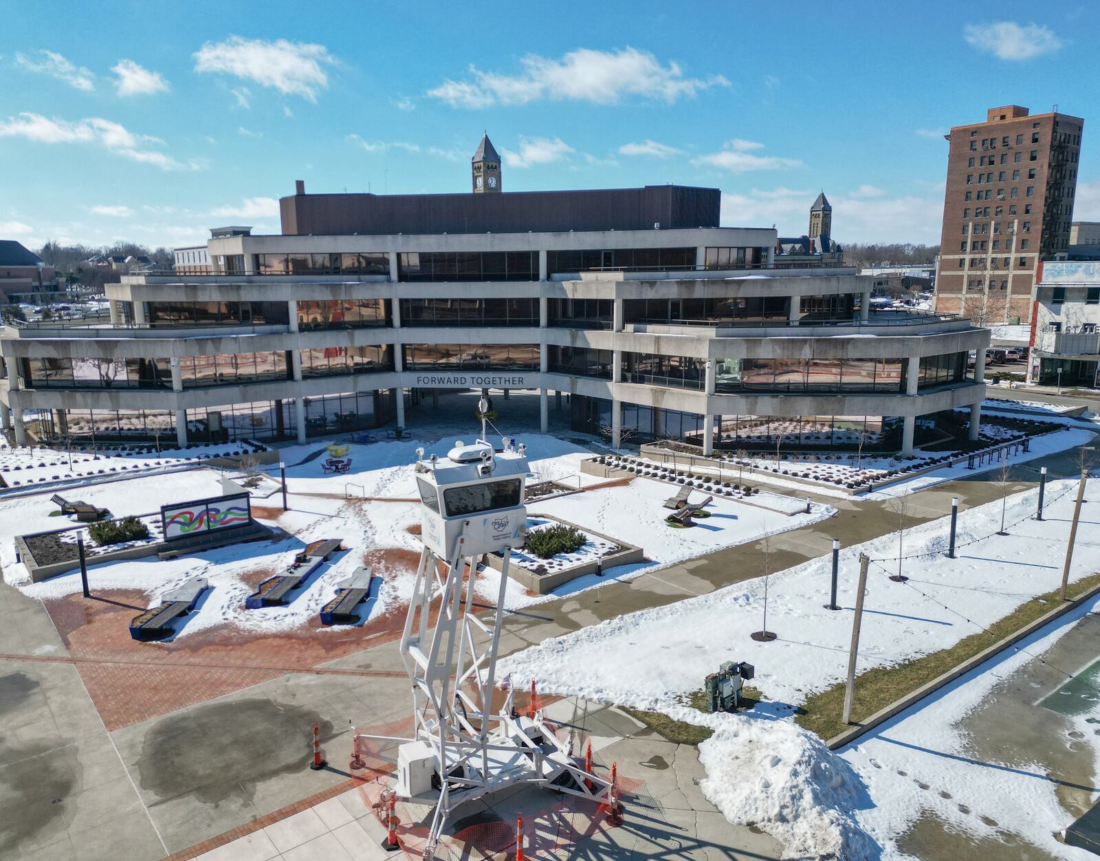Ohio Department of Public Safety had a surveillance tower up Wednesday, Feb. 11, 2026, at Springfield City Plaza, following numerous bomb threats in Springfield. JOSEPH COOKE VIA DRONE / STAFF