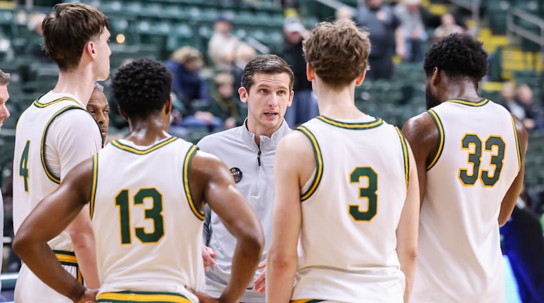 Wright State coach Clint Sargent talks to players during a timeout late in the second half of a 77-74 loss to Detroit Mercy on Thursday, Feb. 12 at Ervin J. Nutter Center in Fairborn. Sargent said the Raiders need to be more consistent in order to hold onto first place in Horizon League standings over the last two weeks of regular season. BRYANT BILLING / STAFF