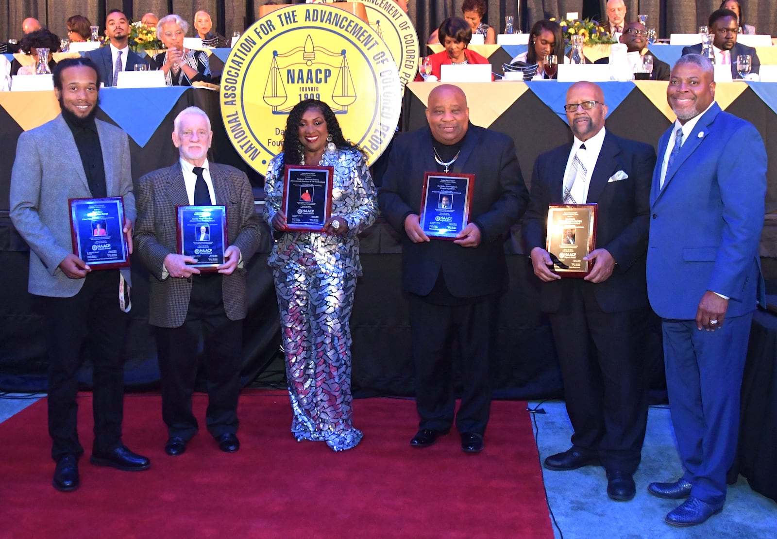 Jenell Ross, Charles “Skip” Hamilton, Phetheria Woodson-Zackery, Dr. Bobby Cartwright, Jr. and Jim Johnson received the President’s Award of Honor by Dr. Derrick L. Foward, the president of the Dayton Branch NAACP.