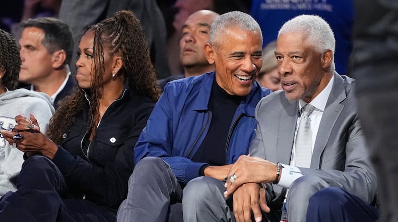 Barack Obama talks to Julius Erving during the NBA All-Star basketball game Sunday, Feb. 15, 2026, in Inglewood, Calif. (AP Photo/Mark J. Terrill)