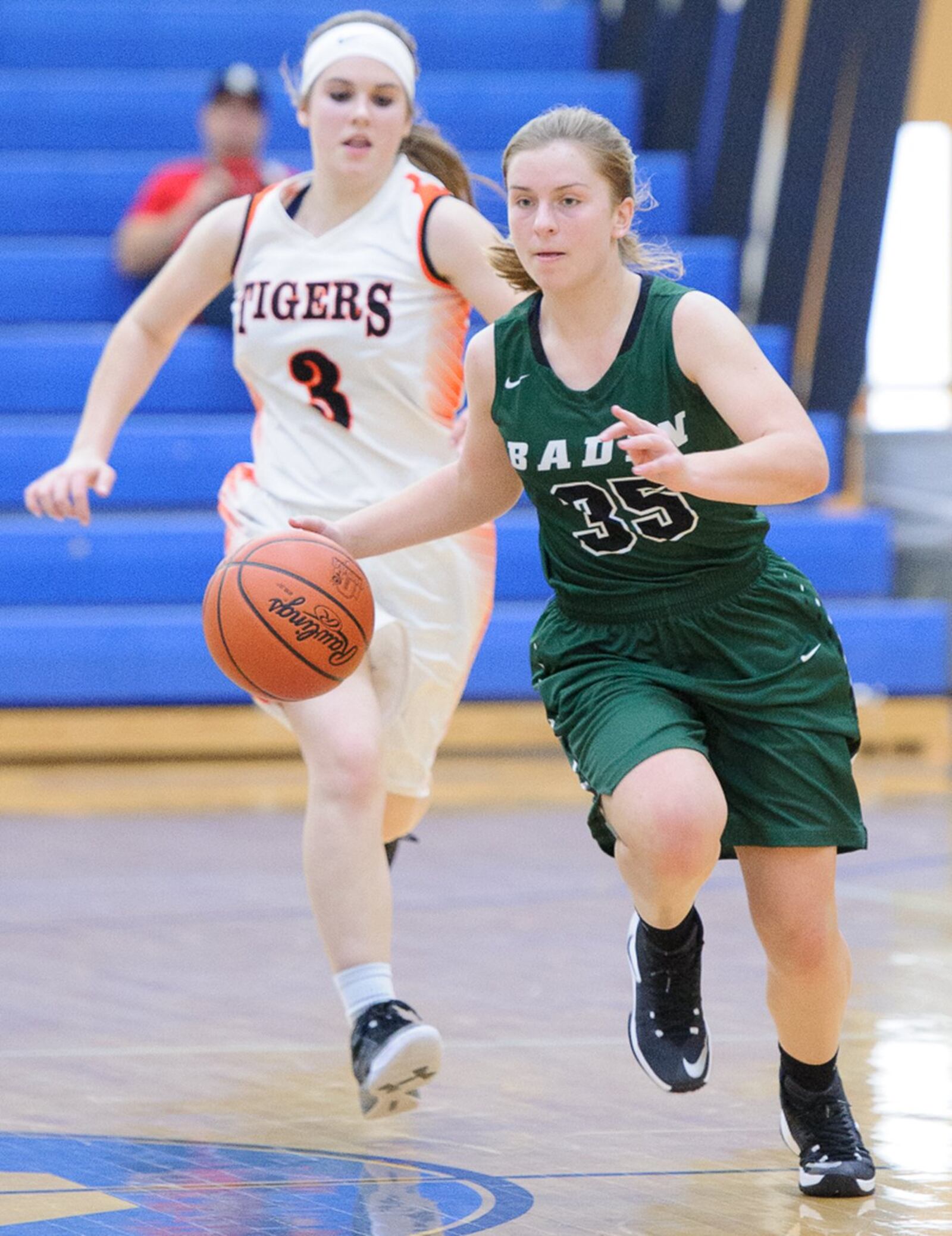 Badin’s Macy Harper dribbles past Kelsey Day of West Liberty-Salem on Saturday during a Division III district final at Springfield. CONTRIBUTED PHOTO BY BRYANT BILLING
