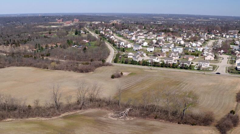 A proposal for 191 new homes - called Deer Valley - on about 69 acres off Benner Road is one of two Miamisburg rezoning requests that would involve building more than 300 new houses. TY GREENLEES / STAFF