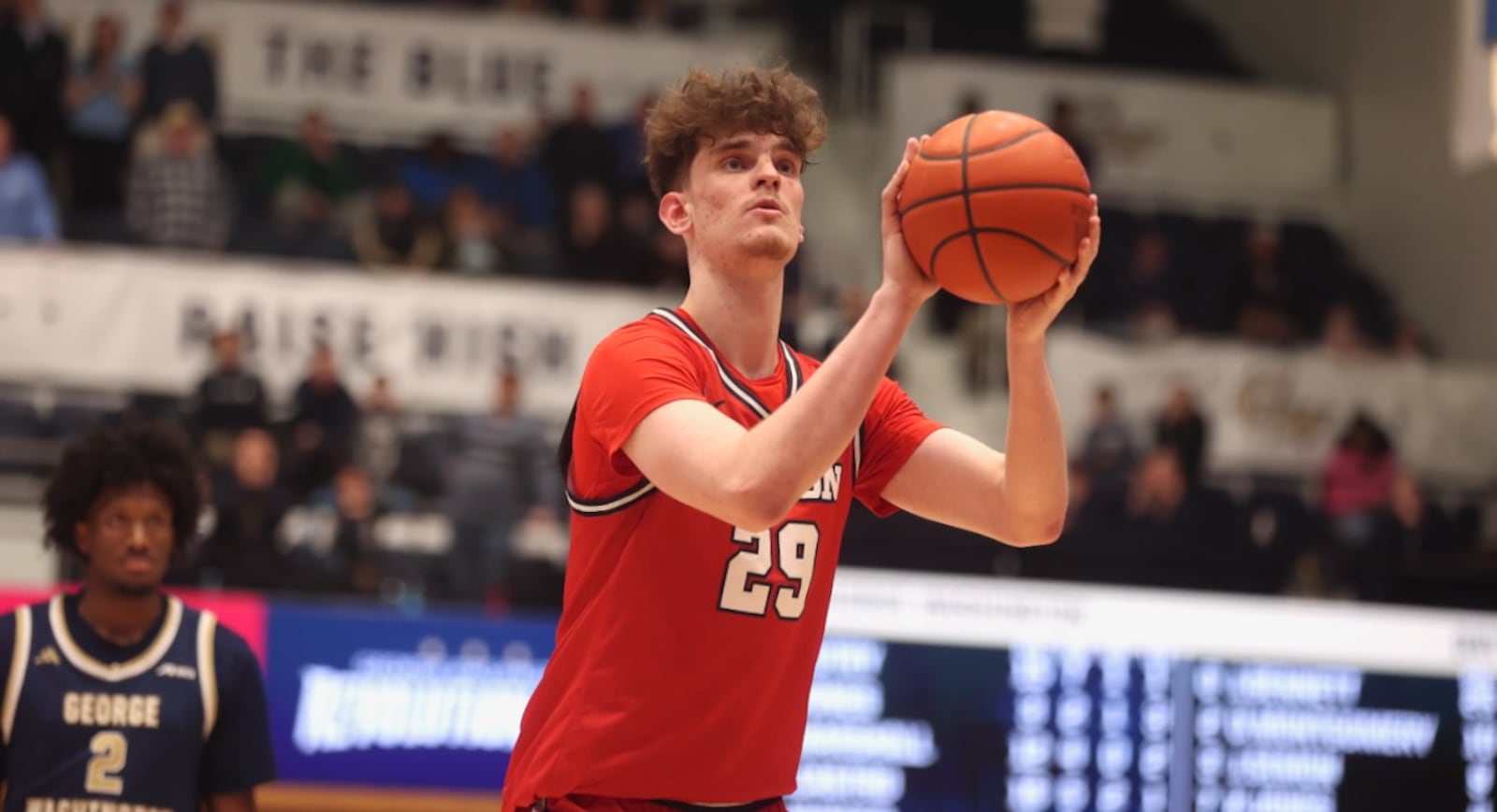 Dayton's Amaël L'Etang makes a go-ahead free throw in the final minute against George Washington on Friday, Feb. 27, 2026, at the Charles E. Smith Center in Washington, D.C. David Jablonski/Staff
