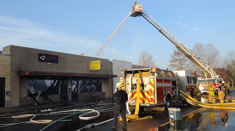 Two businesses suffered heavy fire damage in the 900 block of Patterson Road Thursday morning, March 14, 2024. The cause of the fire remains under investigation. MARSHALL GORBY\STAFF