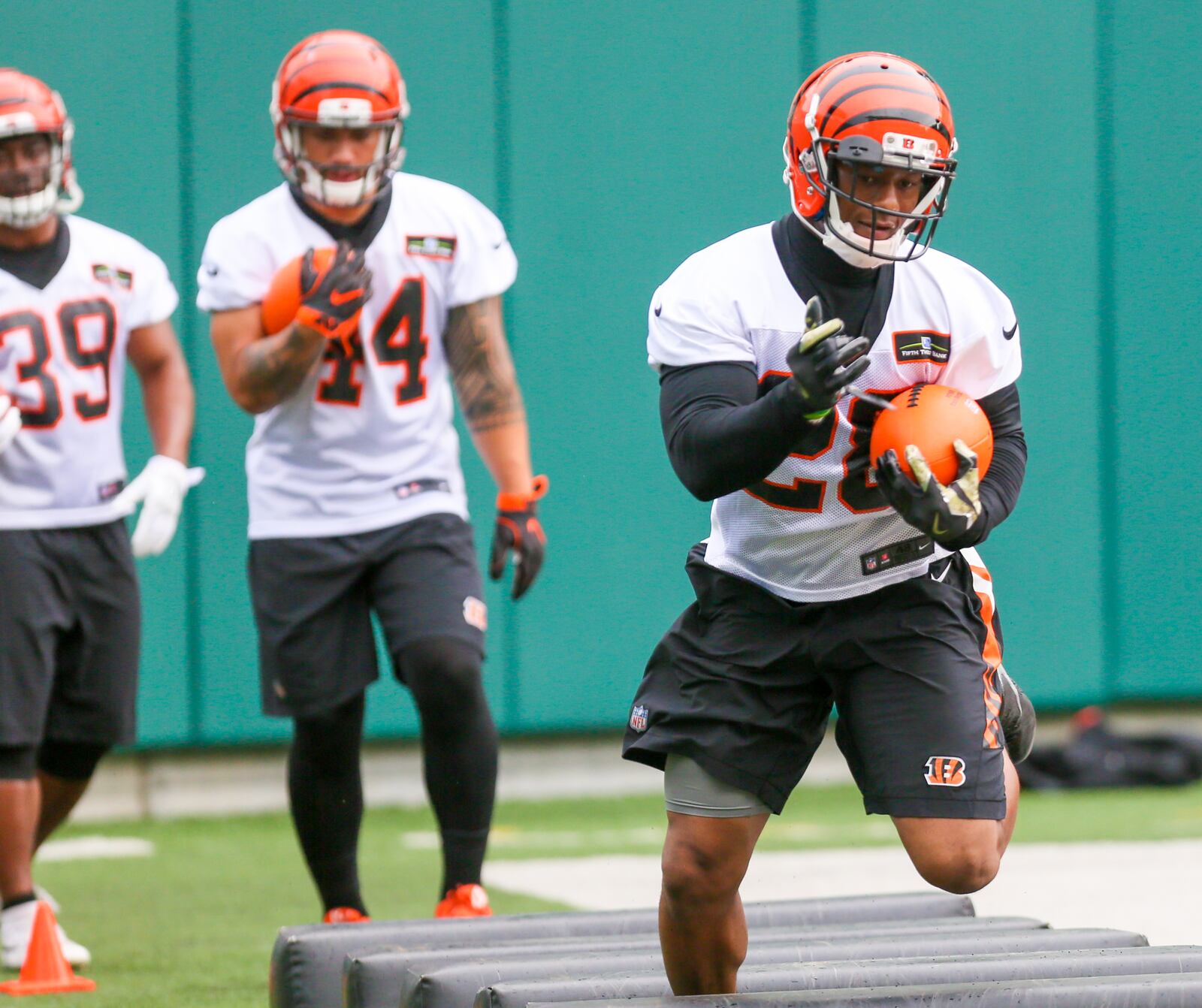 Bengals running back Joe Mixon (28) participates in a team practice at Paul Brown Stadium, Tuesday, June 13, 2017. GREG LYNCH / STAFF