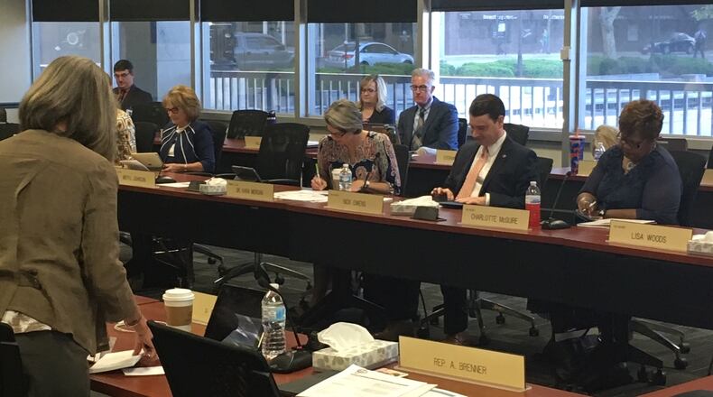 State school board members prepare for a committee meeting on achievement and graduation requirements on Tuesday, May 15, 2018 in Columbus. JEREMY P. KELLEY / STAFF