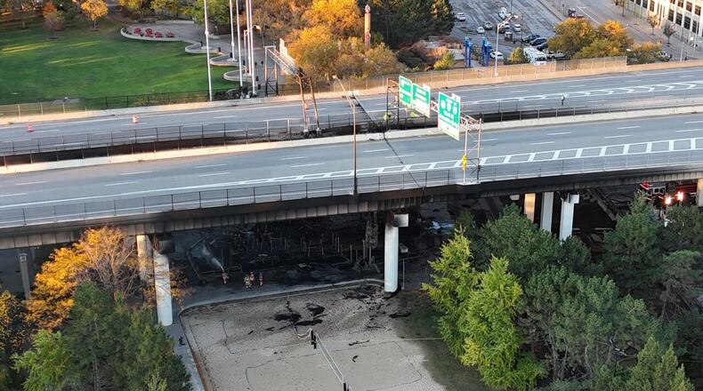 A playground at Sawyer Point Park in Cincinnati was heavily involved in fire and the fire a transmitted to the bridge structure of the I-471 bridge, officials said Friday. WCPO/CONTIBUTED