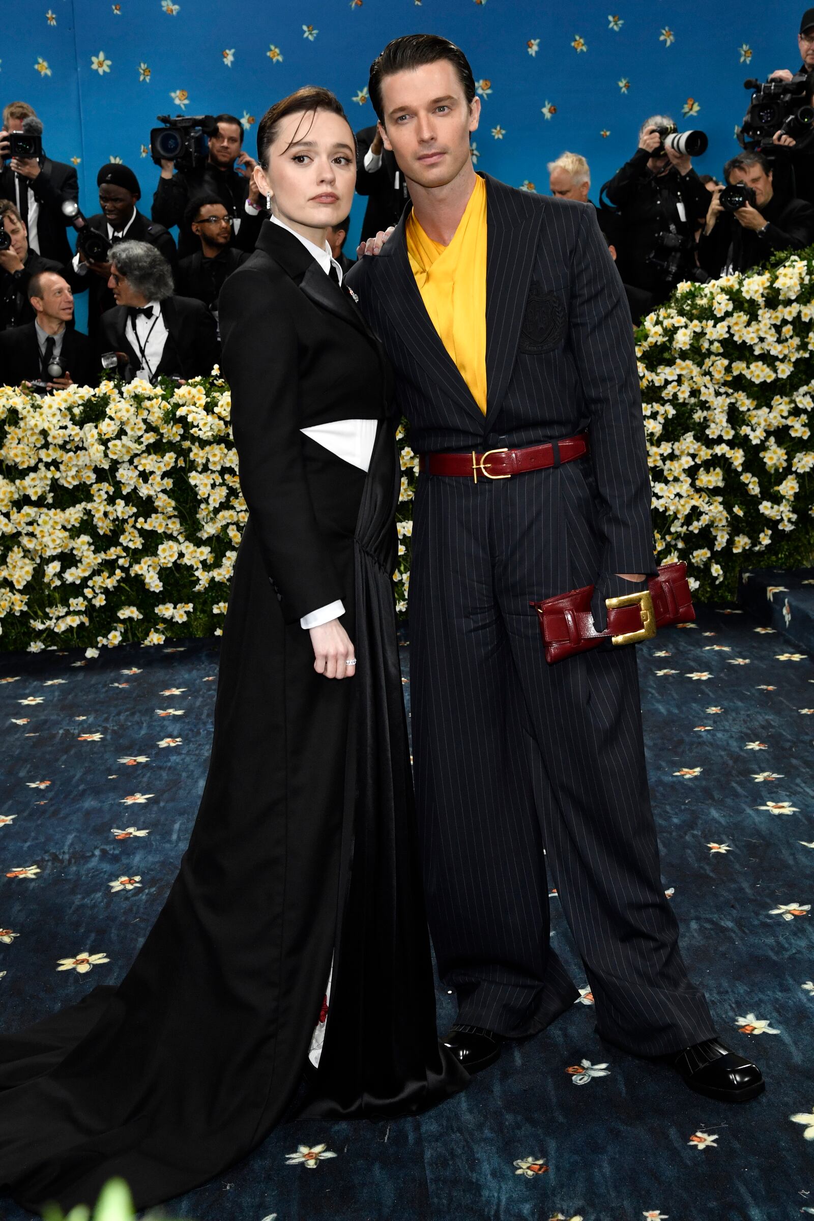 Aimee Lou Wood, left, Patrick Schwarzenegger attend The Metropolitan Museum of Art's Costume Institute benefit gala celebrating the opening of the "Superfine: Tailoring Black Style" exhibition on Monday, May 5, 2025, in New York. (Photo by Evan Agostini/Invision/AP)