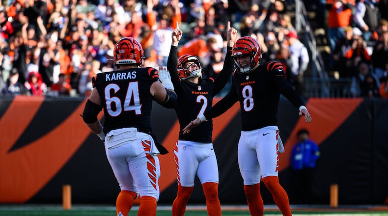 Cincinnati Bengals kicker Evan McPherson celebrates after making a 63-yard field goal at the end of the first half of their game against the New England Patriots on Saturday, Nov. 23, 2025 at Paycor Stadium. JEREMY MILLER / CONTRIBUTED PHOTO