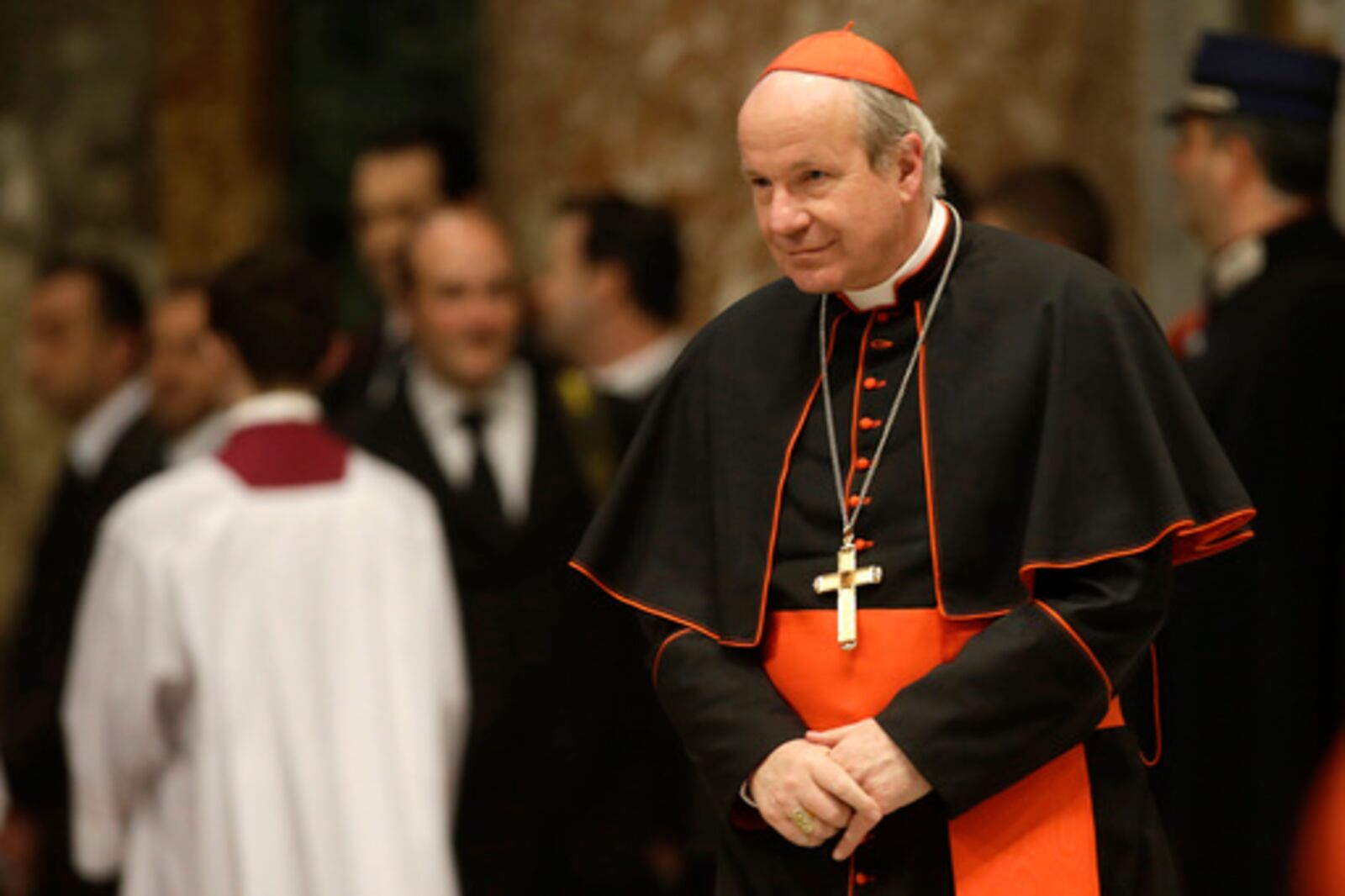 FILE - Cardinal Christoph Schoenborn, of Austria, attends a vespers celebration in St. Peter's Basilica at the Vatican, Wednesday, March 6, 2013. (AP Photo/Gregorio Borgia, File)
