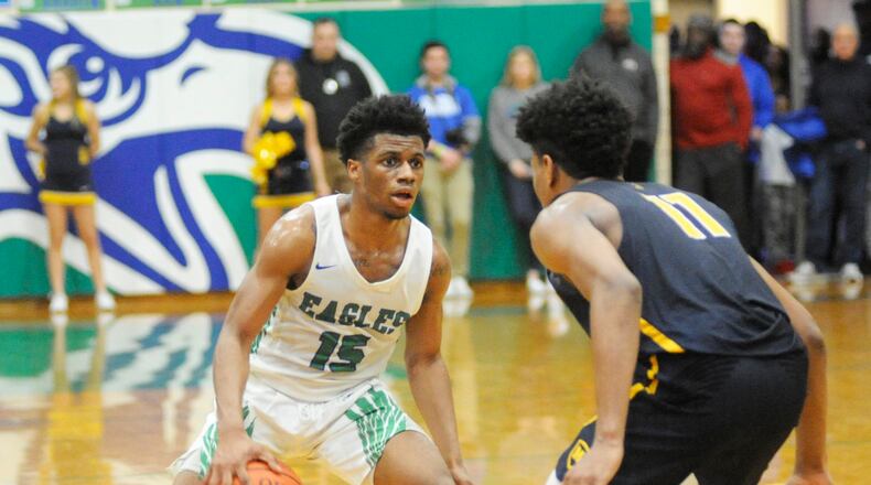 CJ’s Milton Gage (with ball) scored 21 points to help Chaminade Julienne prevail against Fenwick on Friday. MARC PENDLETON / STAFF