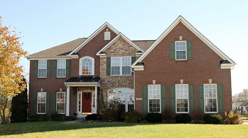 The 2-story sits on a 1-acre lot with corral fencing on a cul-de-sac. The home’s three levels include 4 bedrooms, 3 full bathrooms, a recreation room and fully equipped theater room with bar. CONTRIBUTED PHOTOS BY KATHY TYLER