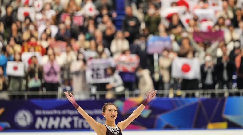 Kaori Sakamoto, of Japan, acknowledges the crowd after performing during the women' free skating program in the ISU Grand Prix of Figure Skating - NHK Trophy in Kadoma, east of Osaka, western Japan, Saturday, Nov. 8, 2025. (AP Photo/Hiro Komae)