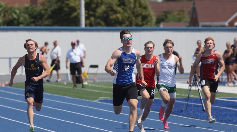 Brookville's Coy Hyre stands atop the podium after winning the 200-meter dash in the OHSAA Division II state track and field championships on Saturday, June 1, 2024, at Welcome Stadium in Dayton. DAVID JABLONSKI / STAFF PHOTO