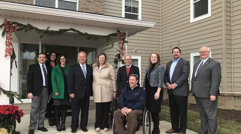 Joseph McCabe, Vice President – Development, Woda Cooper Companies, Inc; Amy Frist, CREA LLC; Diane Alecusan, Ohio Housing Finance Agency; Ambassador Tony Hall; Mayor Nan Whaley; David Cooper, Managing Director, Woda Cooper Companies, Inc; Commissioner Darryl Fairchild; Jennifer Heapy, Chief Executive Director, Greater Dayton Premier Management; Jeffrey Woda, President/Managing Director, Woda Cooper Companies, Inc; Thomas H. Leach, Department of Housing and Urban Development, Columbus Field Office.