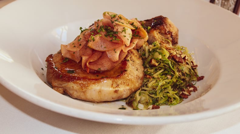 Aaron Braun, a chef at Meadowlark Restaurant won the top honors at the Ohio Pork Council’s 2019 Taste of Elegance Chef Competition and Legislative Reception in New Albany. His cider-glazed pork loin with spicy pickled apple, butternut squash gratin and shredded Brussels sprouts is pictured.