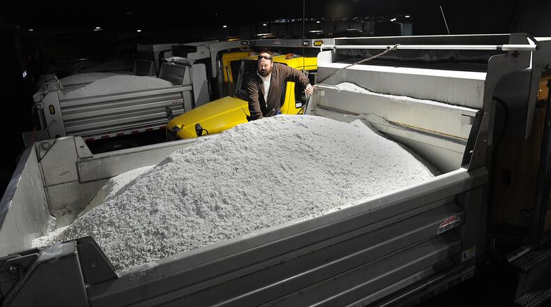 John Jones, Fleet Foreman for the Montgomrty County Engineer, checks over the counties salt and plow trucks Wednesday, Feb. 2, 2022. Each truck carries 6 tons of salt. MARSHALL GORBY\STAFF