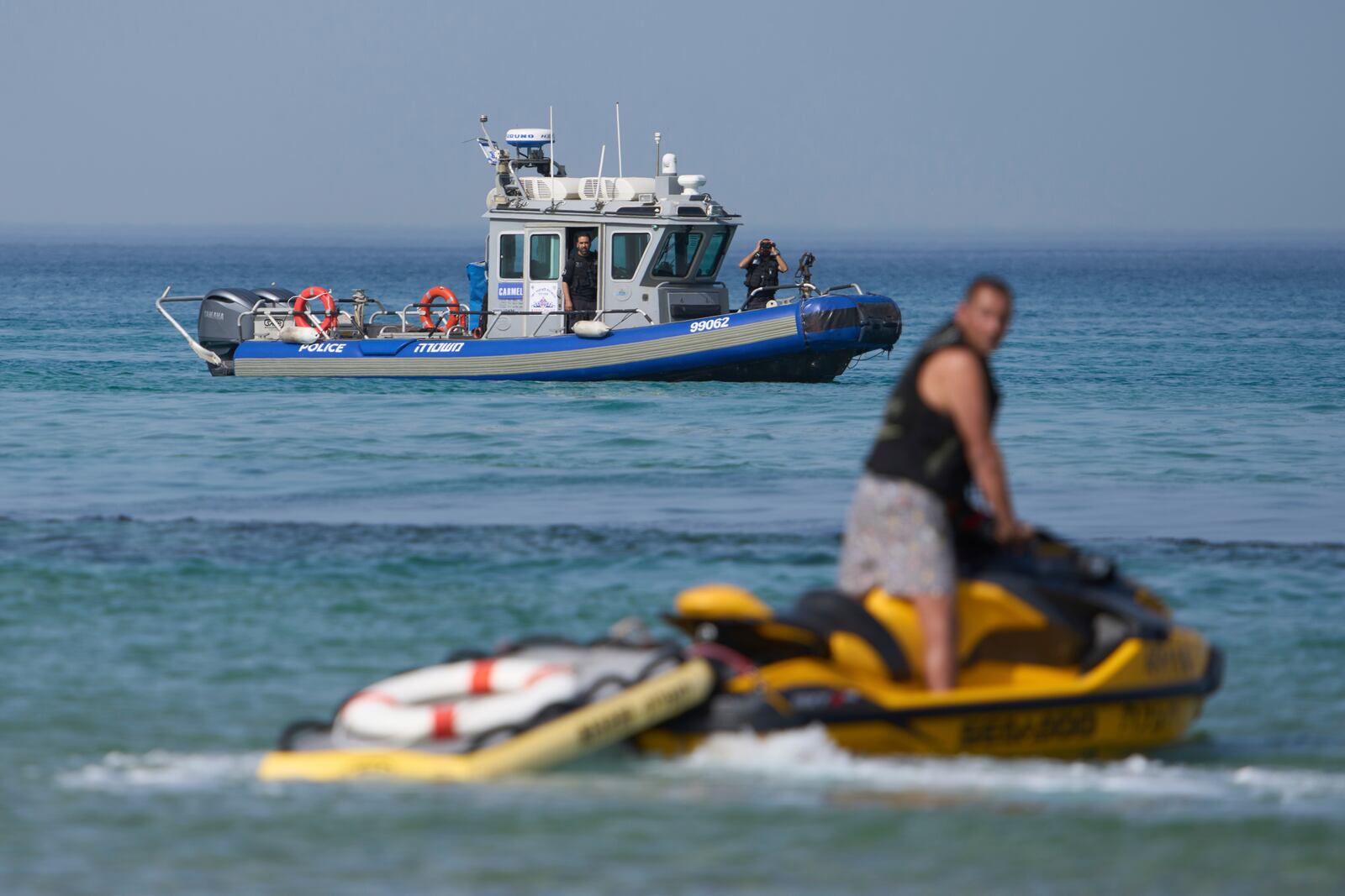 Israeli police are looking for a swimmer who they fear was attacked on Monday by a shark, near the Israeli city of Hadera, Tuesday, April 22, 2025. (AP Photo/Ariel Schalit)