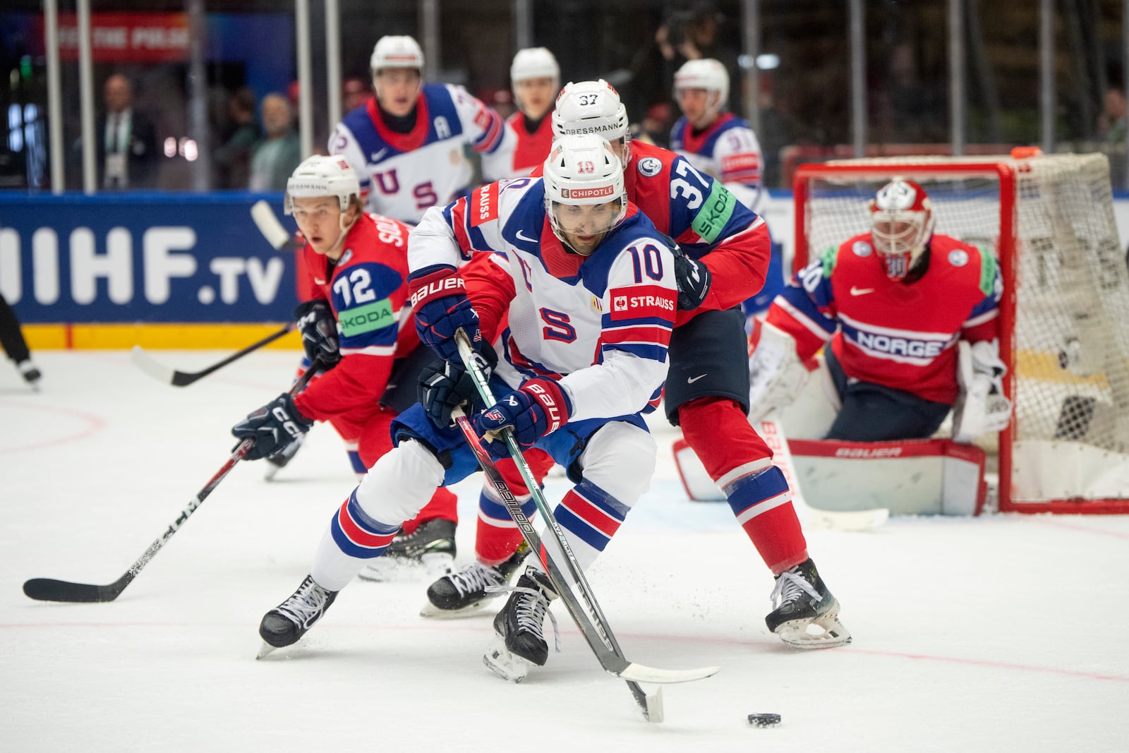 USA's Matty Beniers, front in action during the group B match between USA and Norway at the IIHF Ice Hockey World Championships in Herning, Denmark, Wednesday, May 14, 2025. (Bo Amstrup/Ritzau Scanpix via AP)