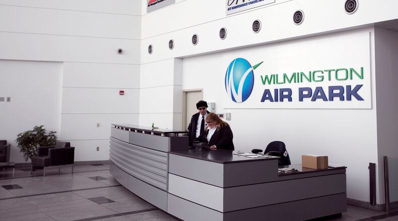 Signage inside the main entrance to Wilmington Air Park displays the variety of business offerings to emerge in the wake of DHL’s pullout in 2008. TY GREENLEES / STAFF