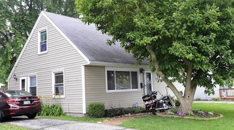 Kettering police are continuing to investigate an officer involved shooting that took place at this home on the 2100 block of Gay Drive in the city. STAFF