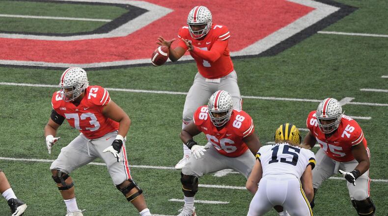 COLUMBUS, OH - NOVEMBER 24:  Michael Jordan #73 of the Ohio State Buckeyes, Malcolm Pridgeon #66 of the Ohio State Buckeyes and Thayer Munford #75 of the Ohio State Buckeyes  block against the Michigan Wolverines at Ohio Stadium on November 24, 2018 in Columbus, Ohio. Ohio State defeated Michigan 62-39.  (Photo by Jamie Sabau/Getty Images)