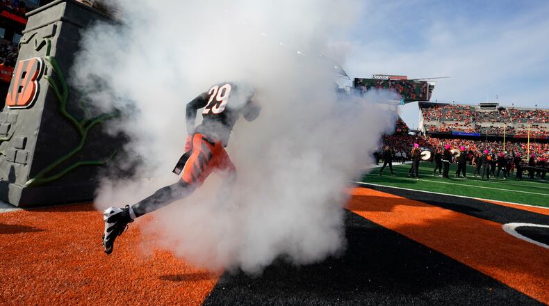 Cincinnati Bengals cornerback Cam Taylor-Britt (29) runs onto the field before an NFL football game against Cleveland Browns, Sunday, Dec. 22, 2024, in Cincinnati. (AP Photo/Jeff Dean)