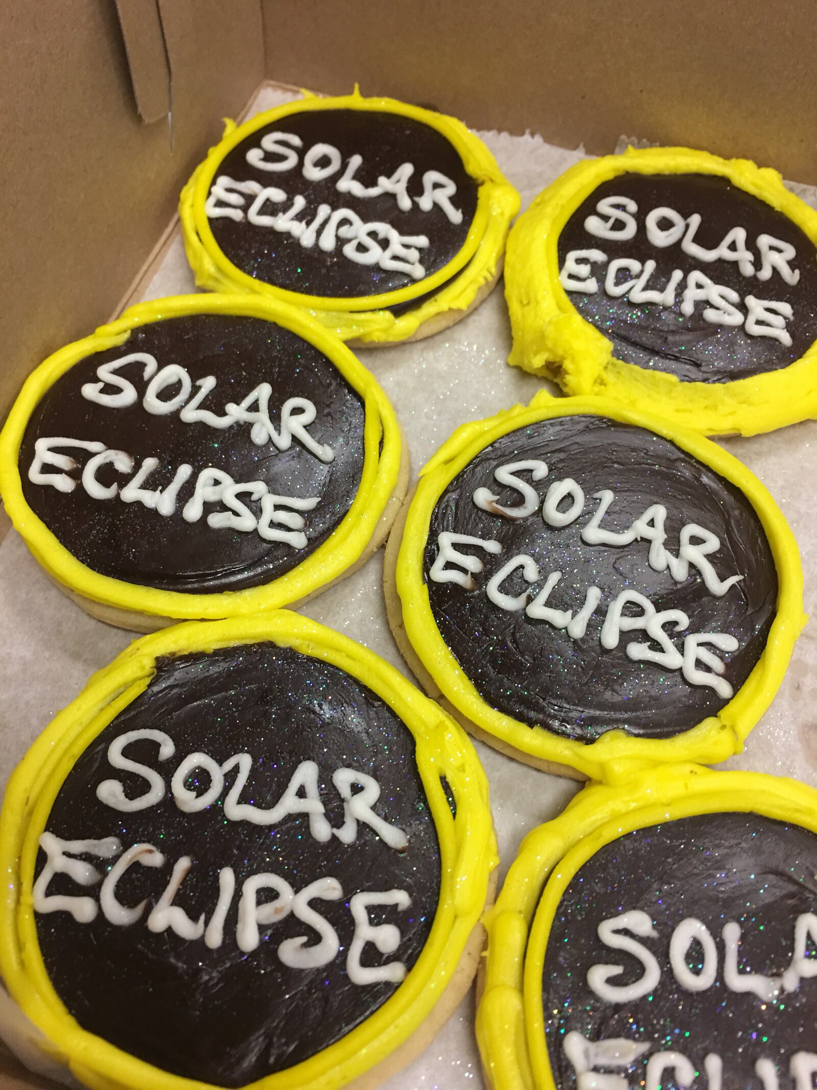 These solar eclipse cupcakes from Ashley's Pastry Shop in Oakwood are available now through Monday while supplies last for $2 each. ALLEGRA CZERWINSKI/STAFF